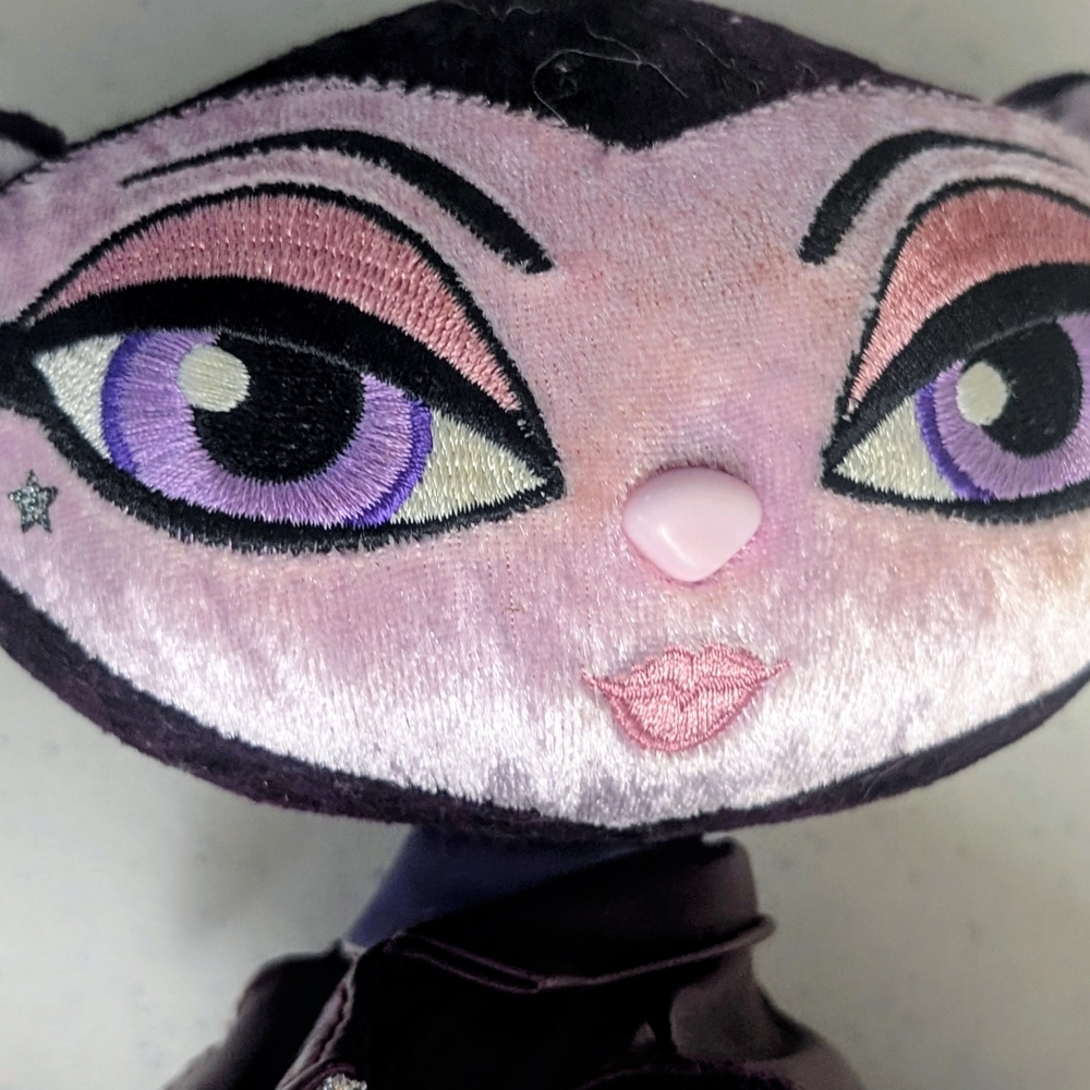 Purple and Pink Stuffed Animal Toy